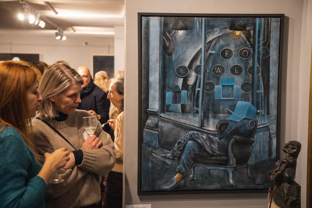 Guests before a large canvas at Gagliardi Gallery.