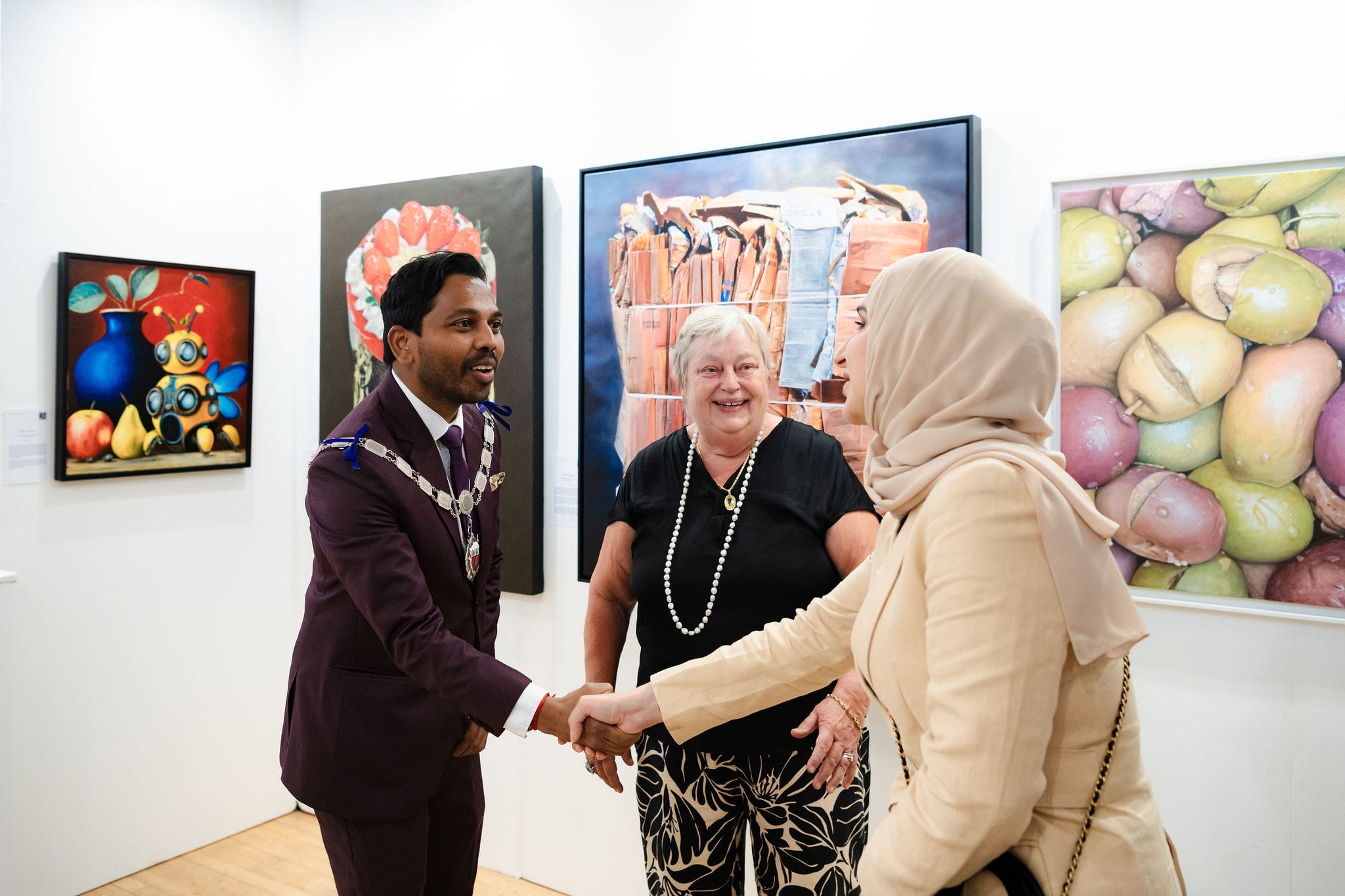 The Mayor of Kensington and Chelsea greeting visitors in the exhibition during the Biennale.
